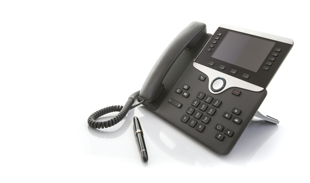 Modern,Business,Office,Ip,Telephone,With,Pen,On,A,White